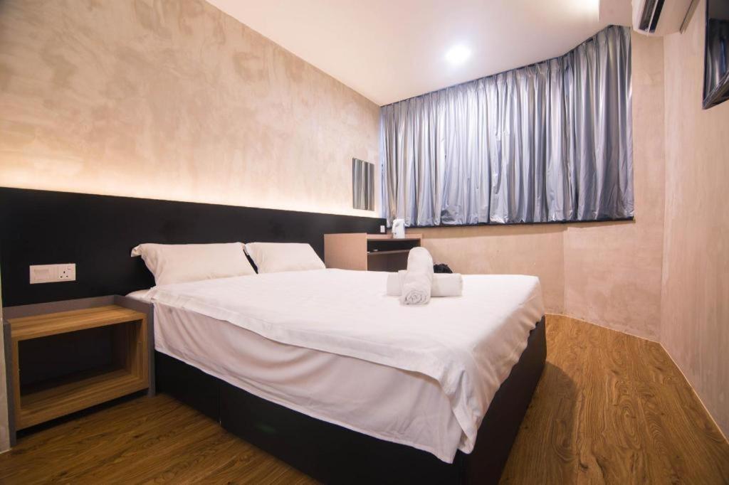Monaco Boutique Hotel Sadong Jaya Kota Kinabalu Luaran gambar